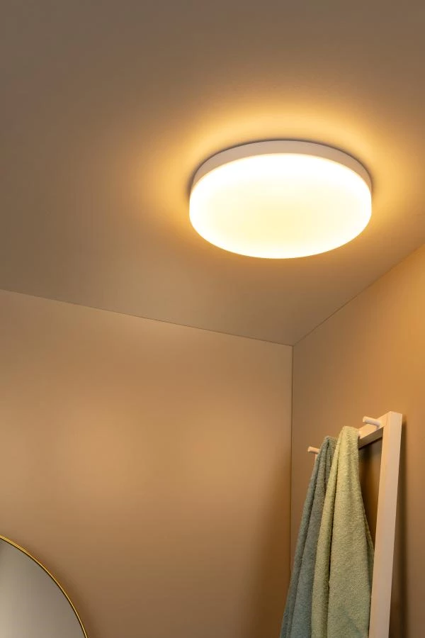 Lucide BISKIT - Flush ceiling light Bathroom - Ø 40 cm - LED - 1x36W 2700K - IP44 - Motion & Day/Night Sensor - White - atmosphere 1